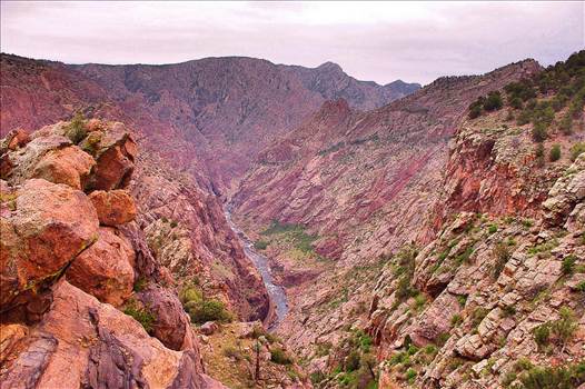 The Royal Gorge Canyon near Canon City, Colorado. - The inspiring view from one of the world's highest suspension bridges - hanging 956 feet & spanning 1/4 mile across the canyon is a must see for any photographer. Take a 7 paggenger trolley across the canyon via a wire cable or choose to seek astonishing 